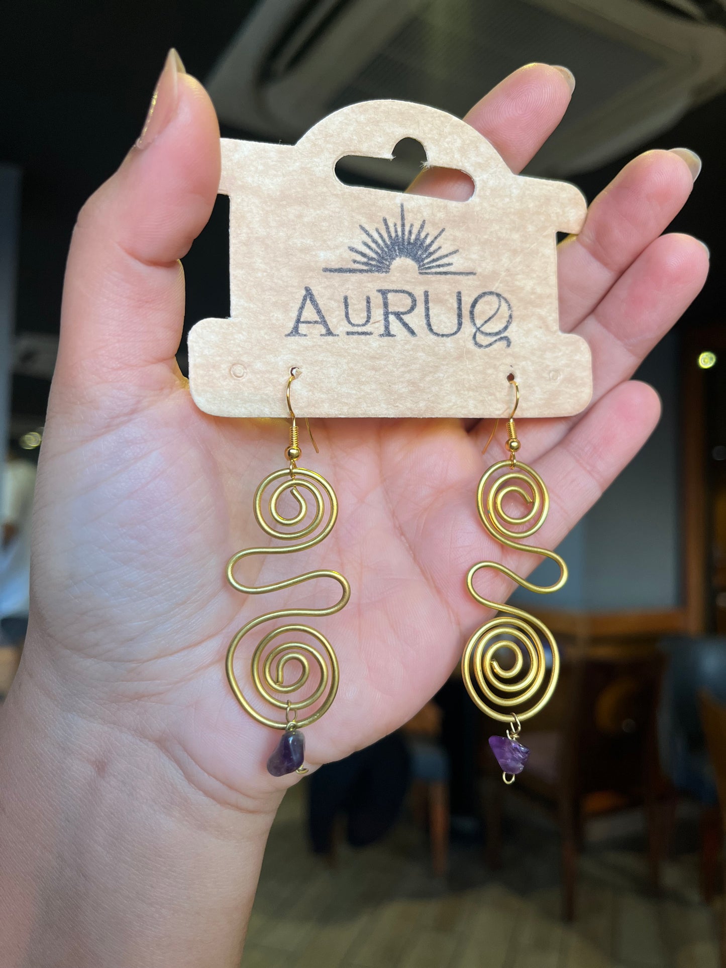 Gemstone spiral paired earrings.
