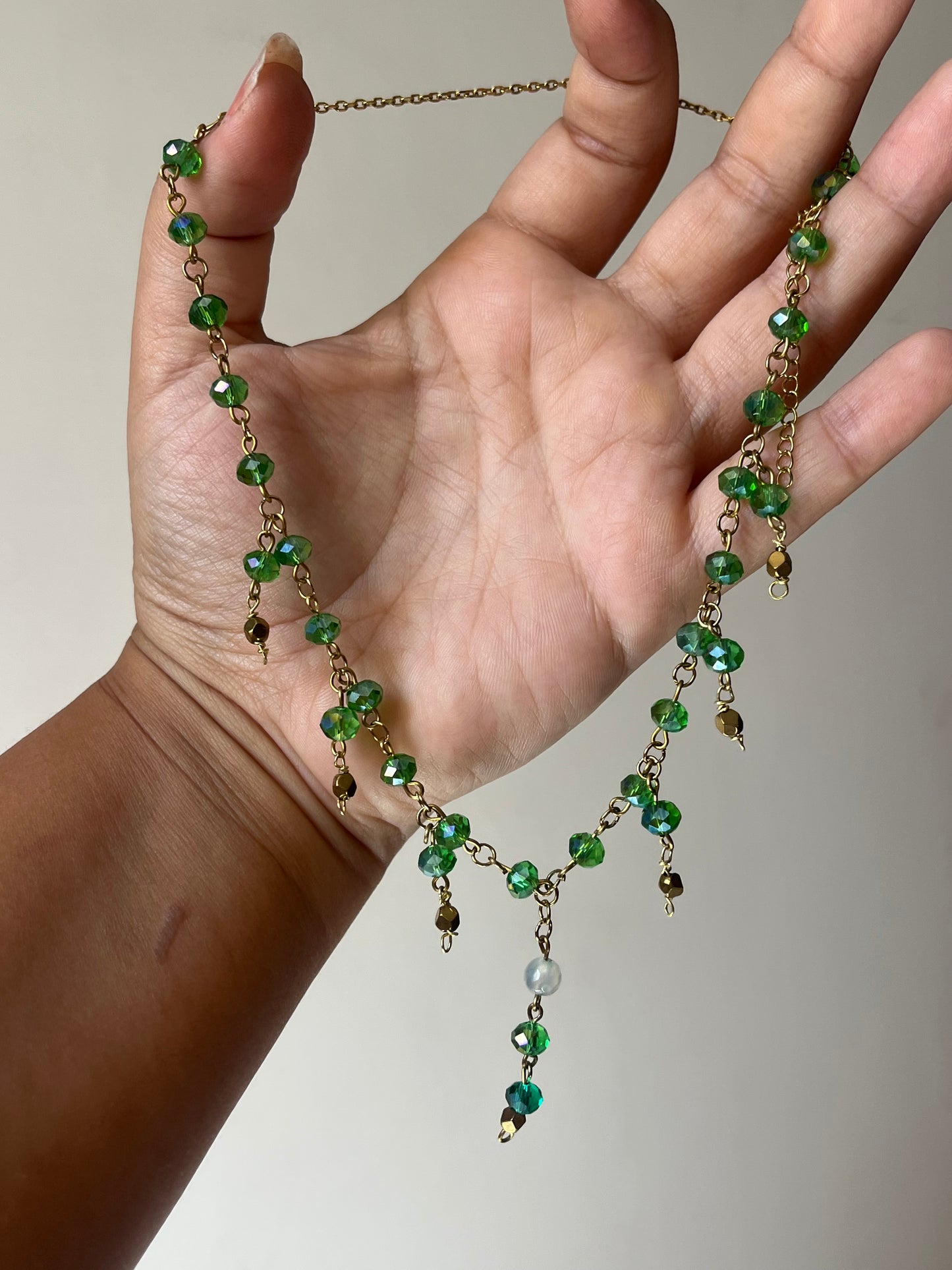 Green crystals necklace.