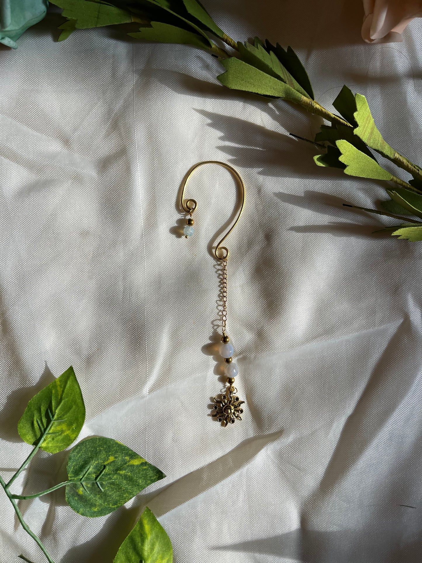 Single sun ear cuff.