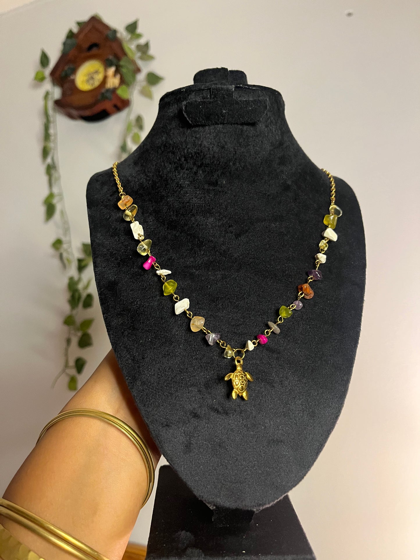 Colorful gemstones turtle necklace .