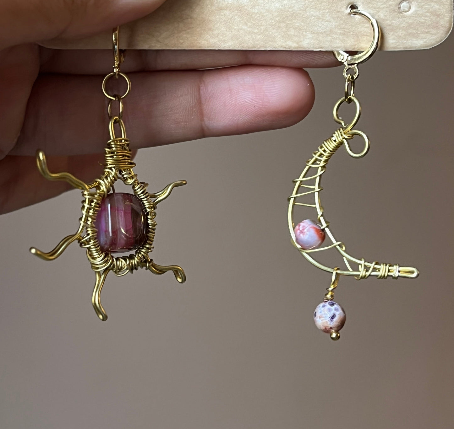 Sun and moon paired earrings.