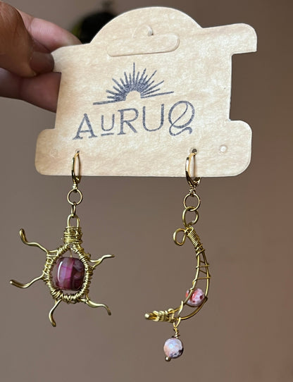 Sun and moon paired earrings.