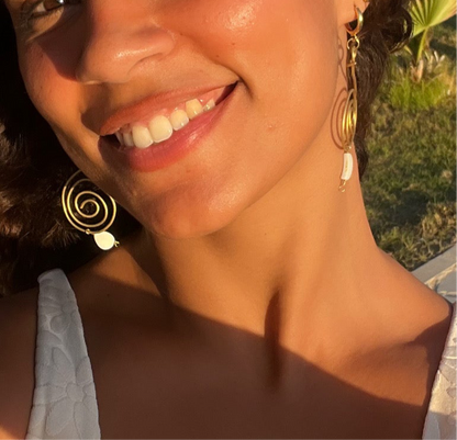 Non-identical spiral paired earrings.