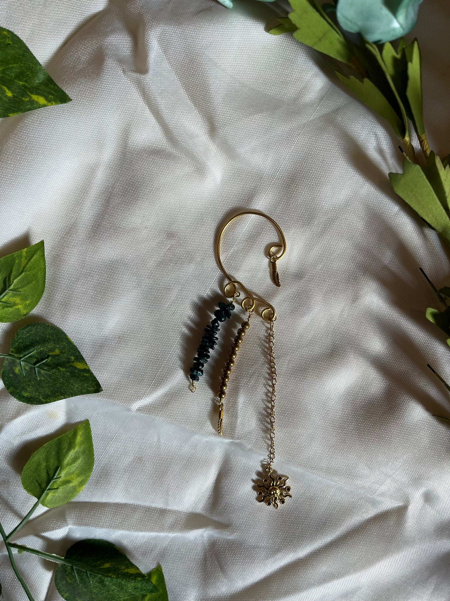 Dark green sunny ear cuff.