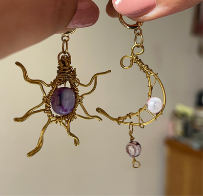 Sun and moon paired earrings.