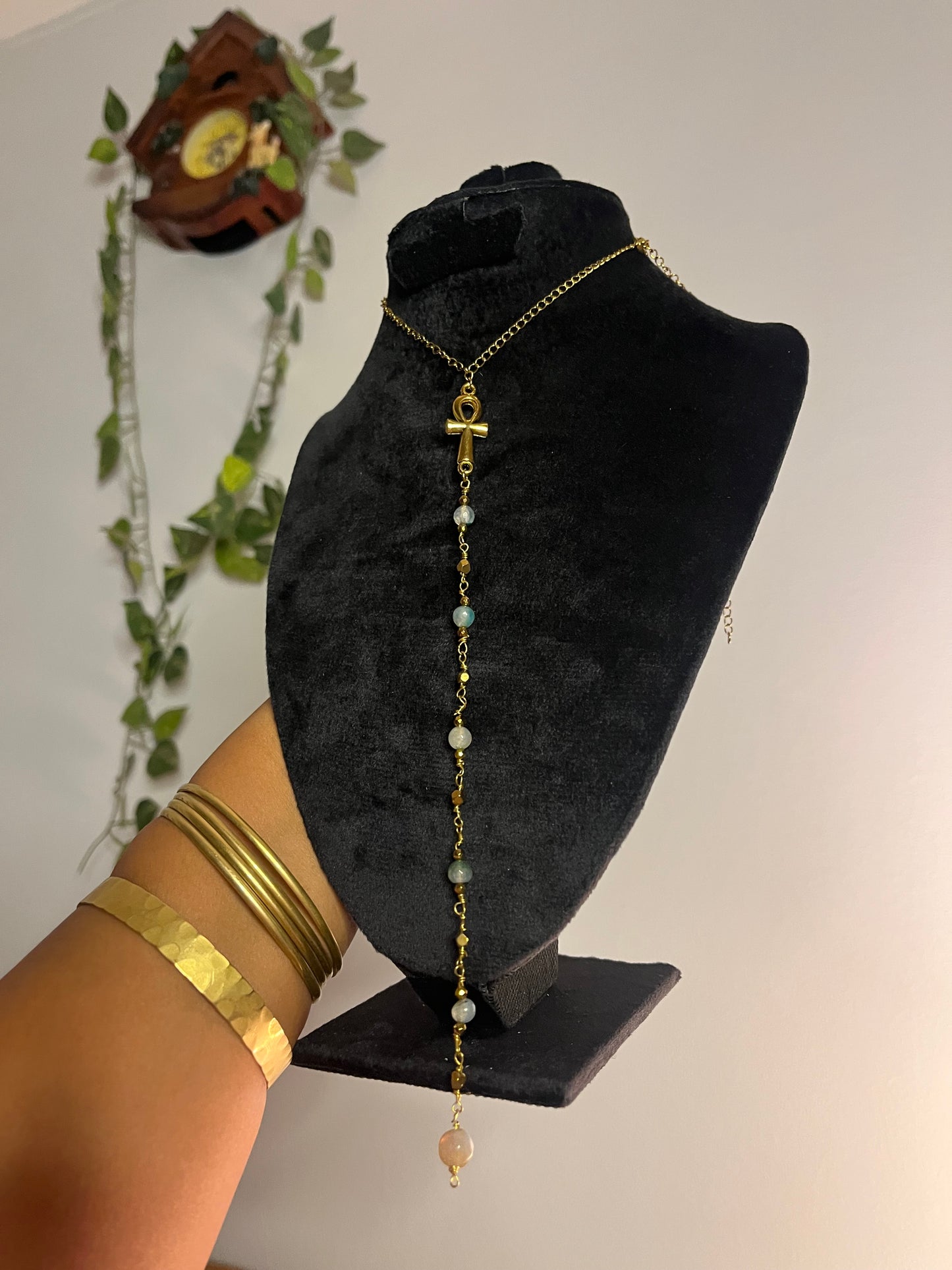 Key of life drop necklace.