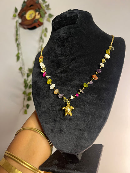 Colorful gemstones turtle necklace .