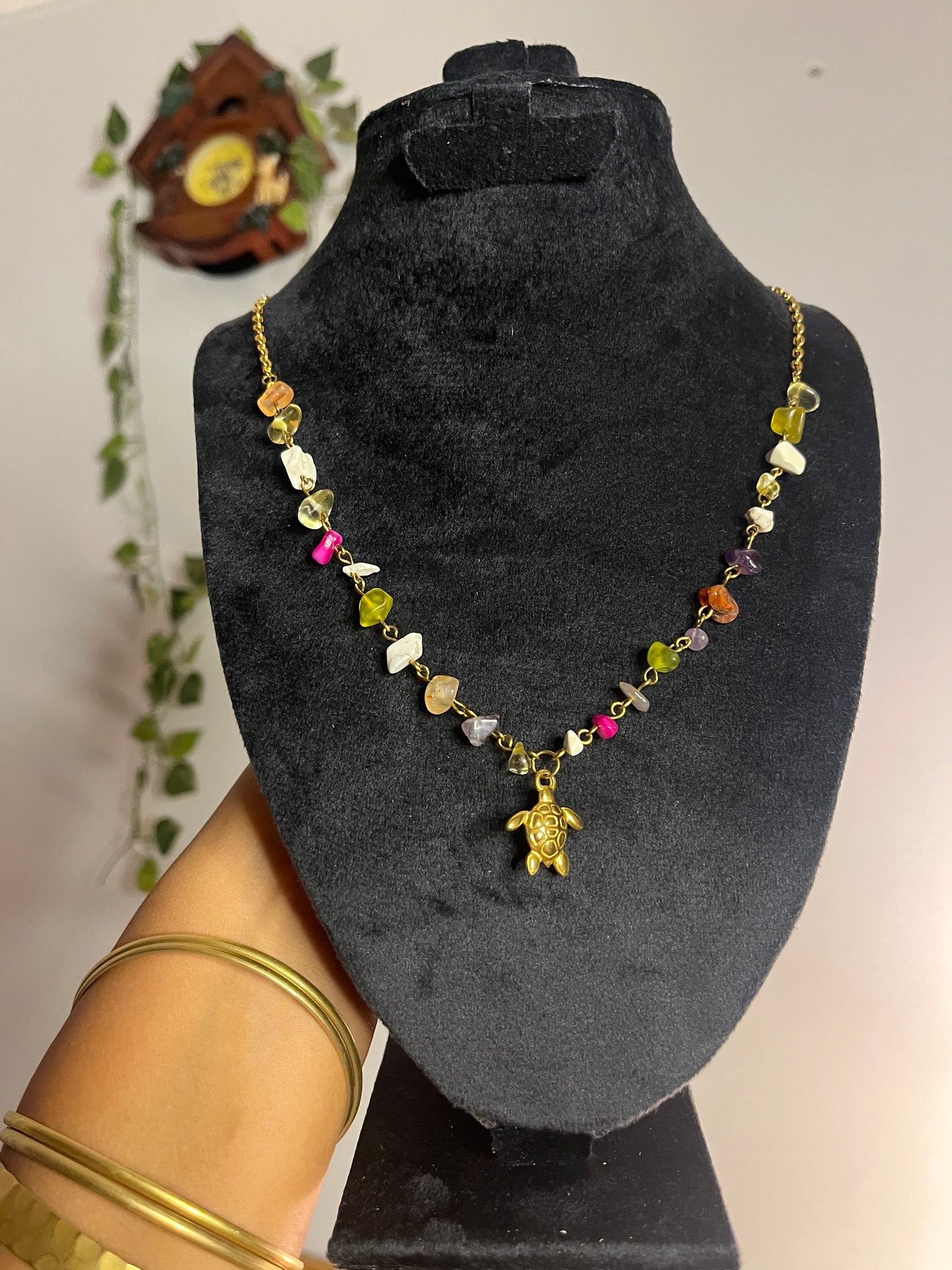 Colorful gemstones turtle necklace .