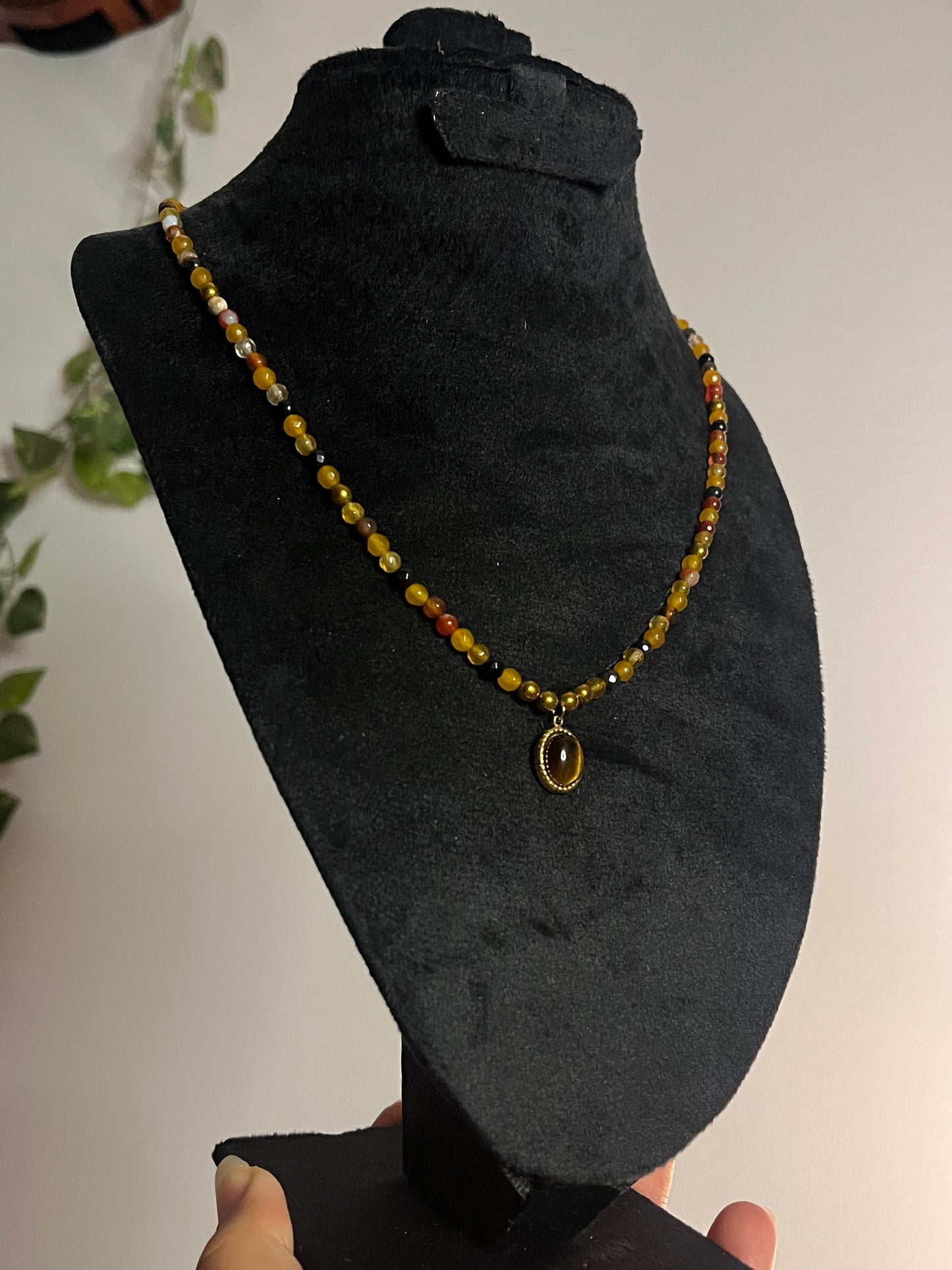 Tiger eye necklace .