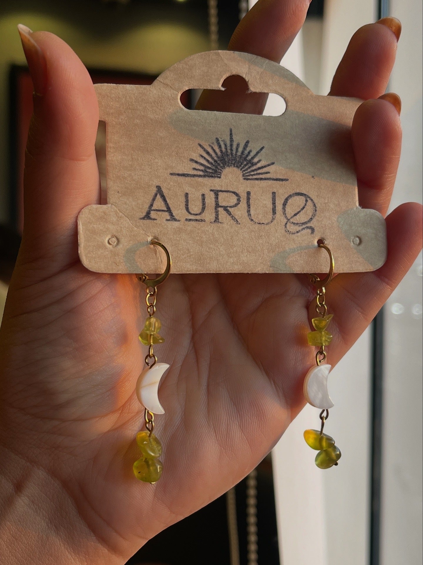 Moon gemstones paired earrings.