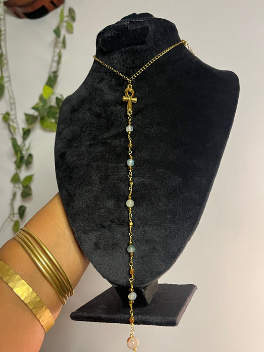 Key of life drop necklace.