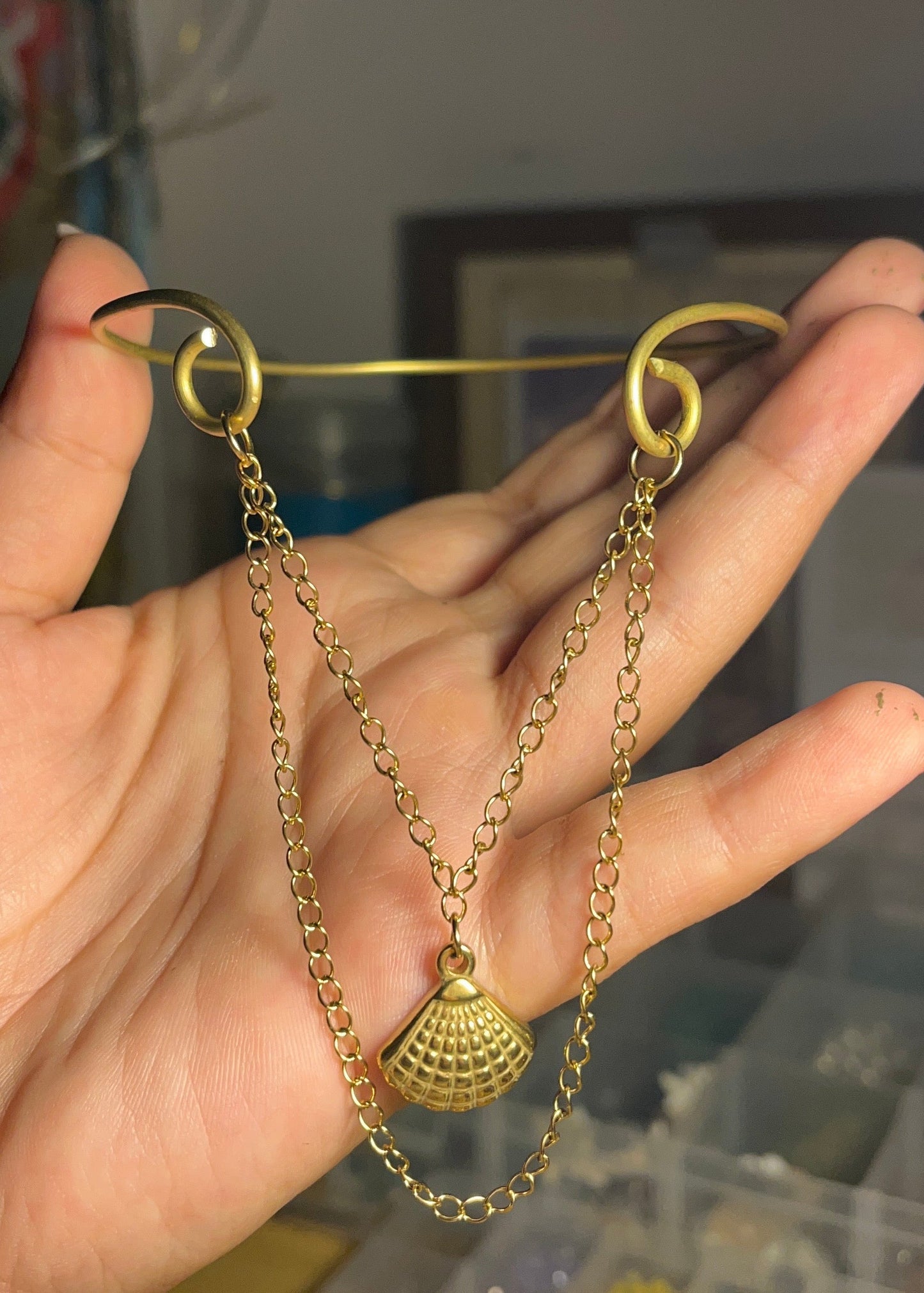 Golden shell Arm cuff.