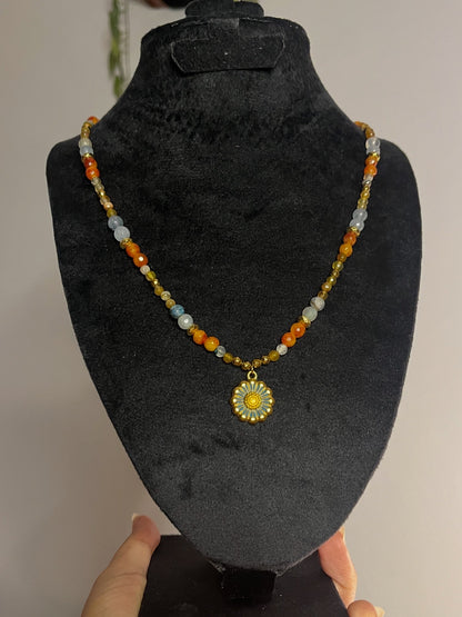 Daisy warm colored necklace.