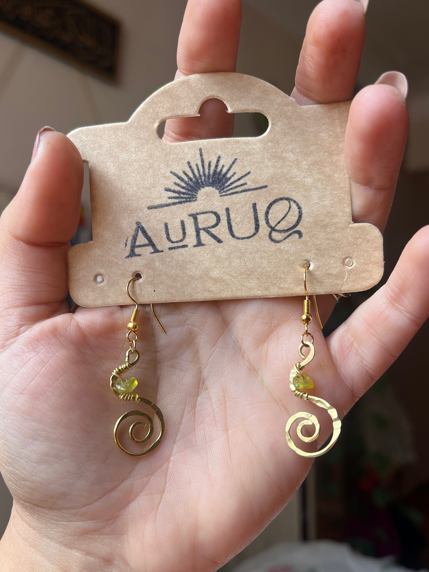 Small spiral gemstone earrings.