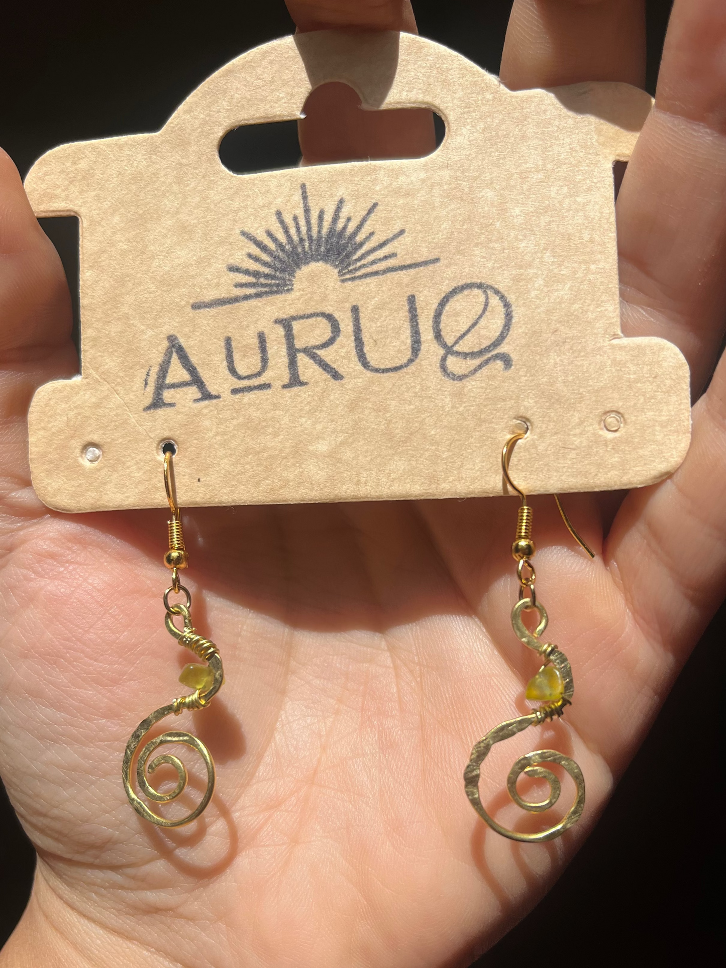 Small spiral gemstone earrings.