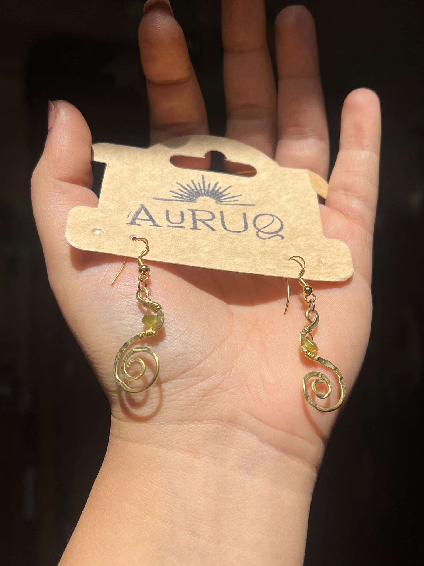 Small spiral gemstone earrings.