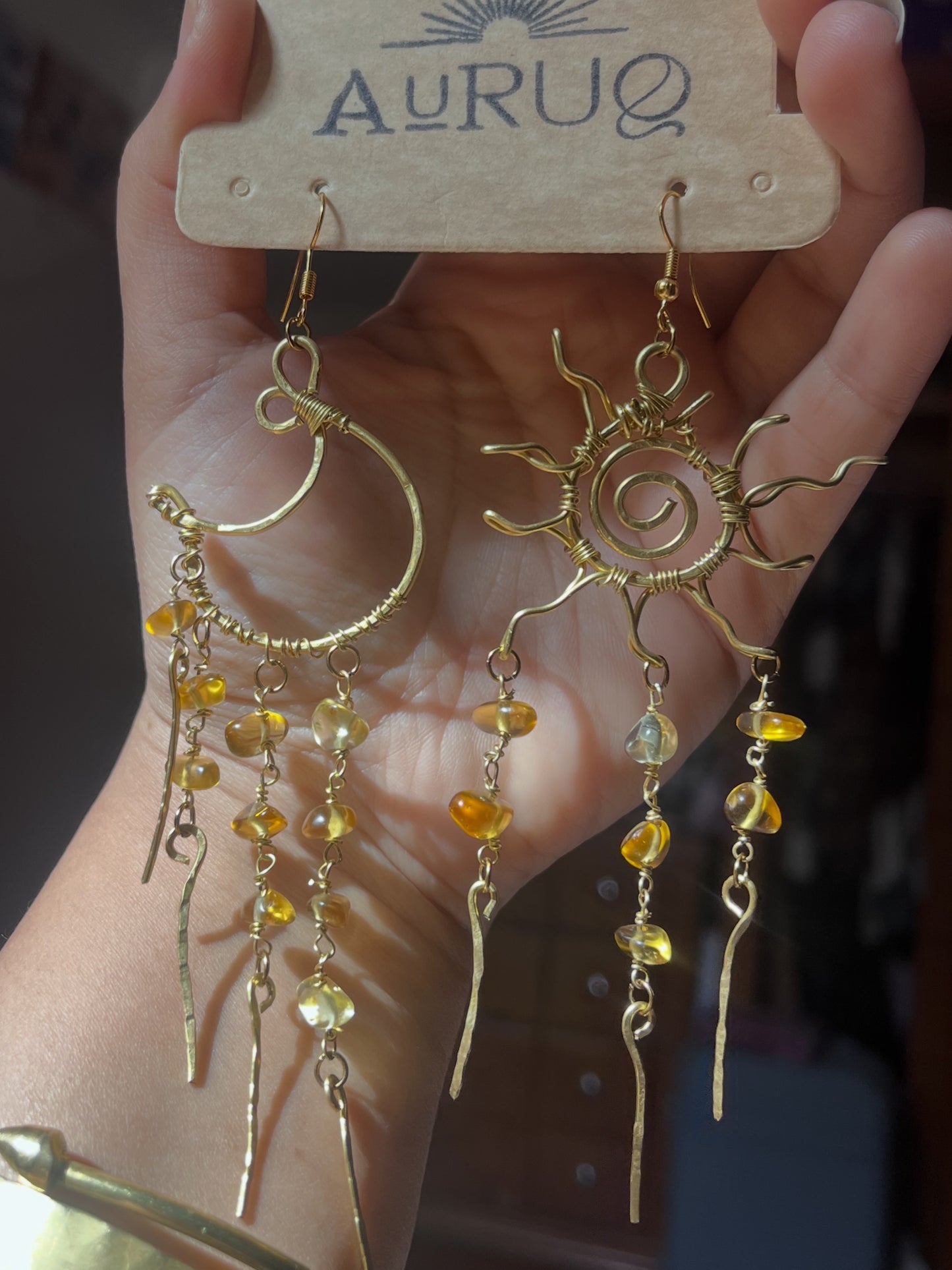 Chandelier sun and moon earrings.