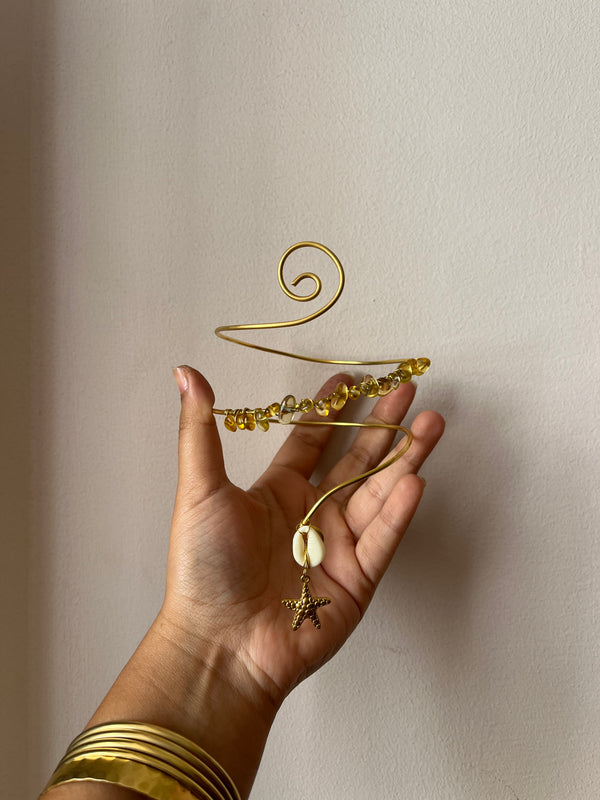 Yellow Shelly Arm cuff.