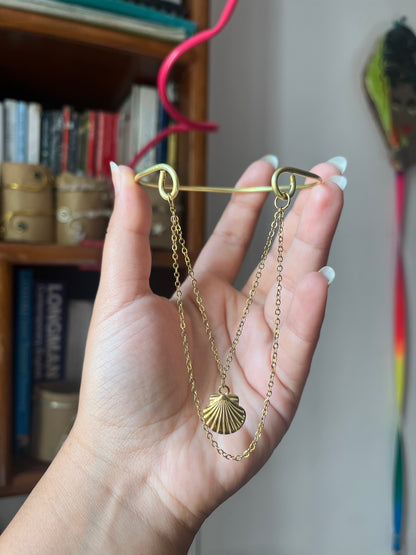 Golden shell Arm cuff.