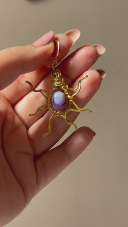 Sun and moon paired earrings.